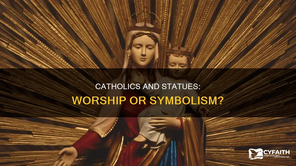 do catholics worship statues or symbols