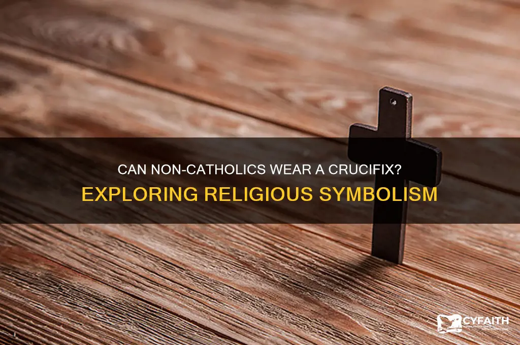 do you have to be catholic to wear a crucifix