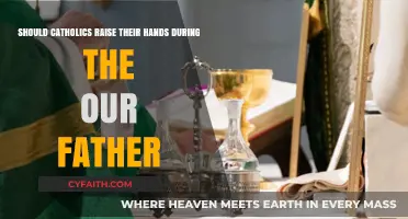 Should Catholics Raise Hands During the Our Father? Exploring Tradition
