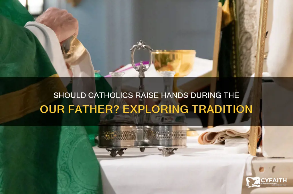 should catholics raise their hands during the our father