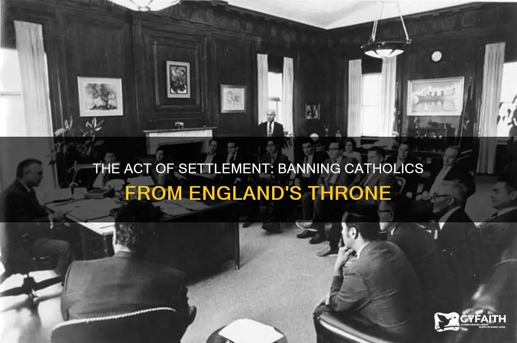 what act banned catholics from becoming rulers of england