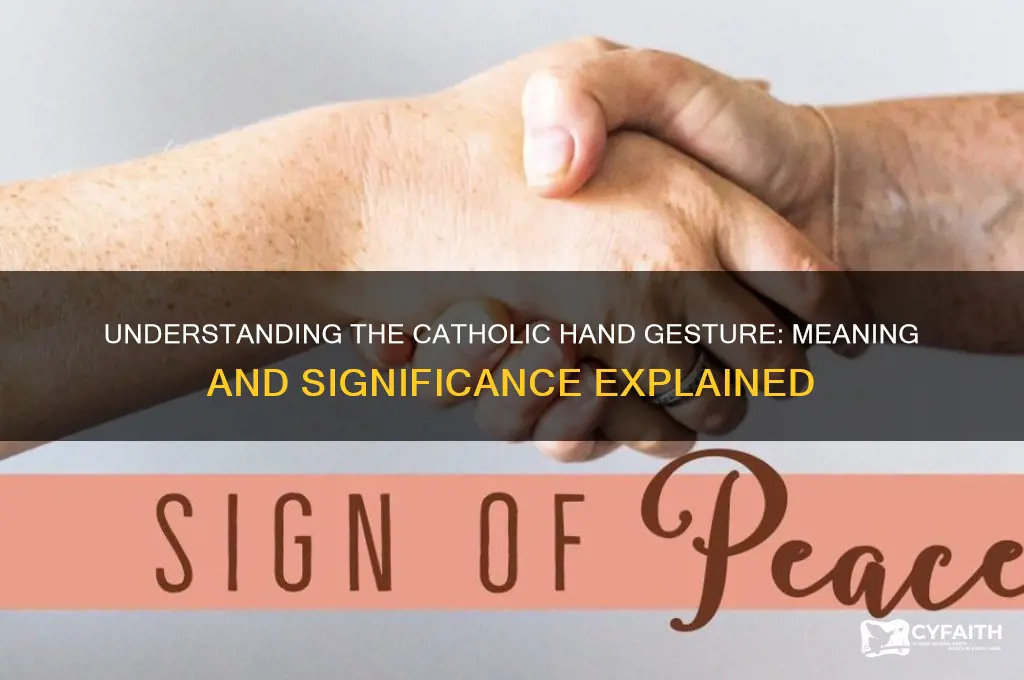 what is the catholic sign with hands