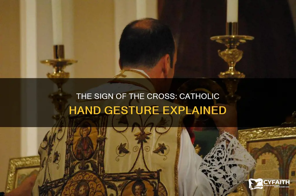 what is the hand gesture catholics do