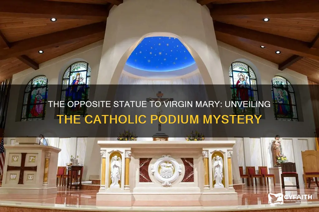 who is opposite statue to virgin mary behind catholic podium