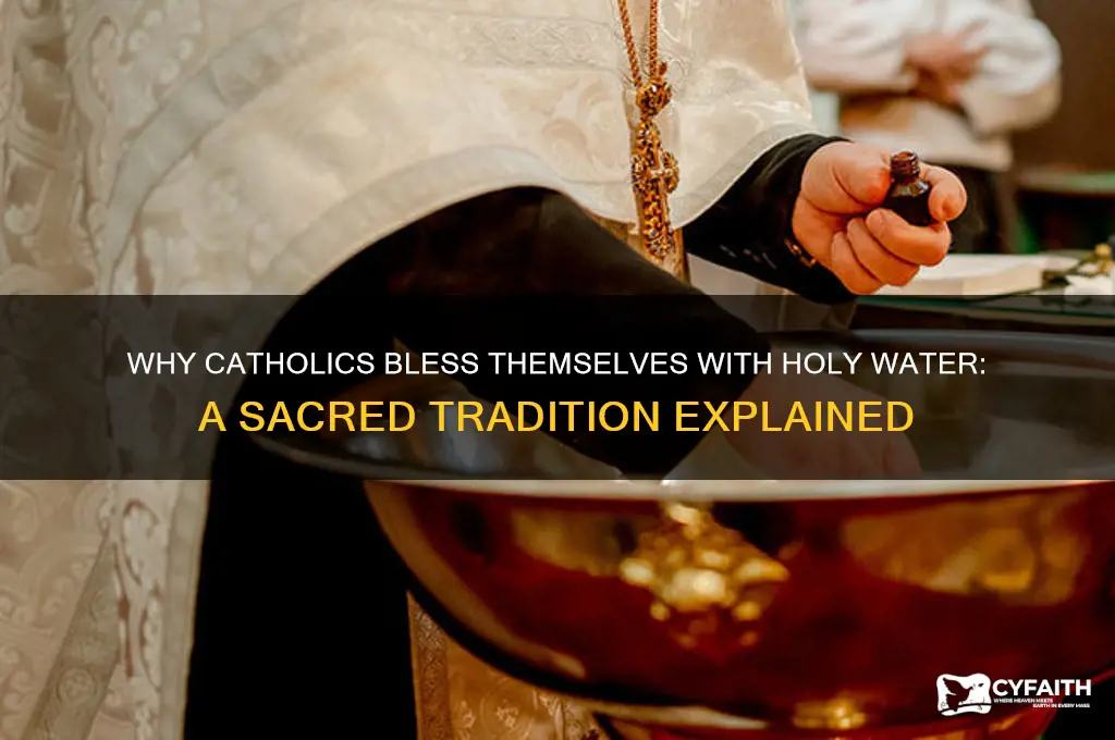 why do catholic bless themselves with holy water