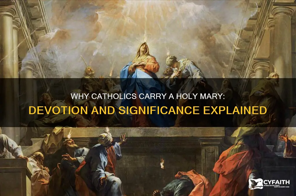 why do catholics carry a holy mary