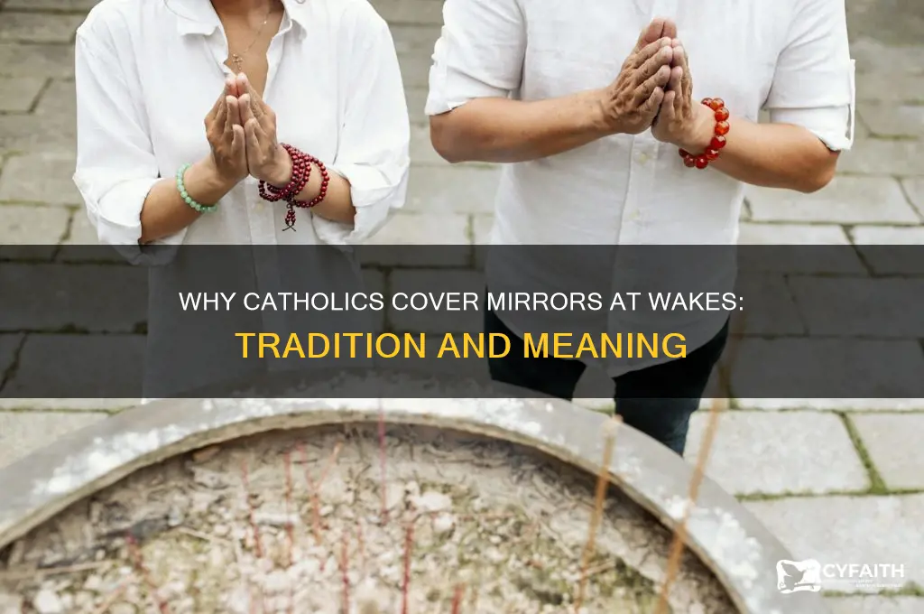 why do catholics cover mirrors at a wake