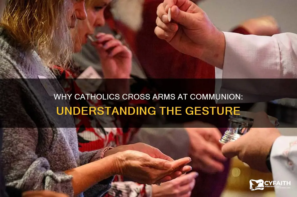 why do catholics cross arms at communiom