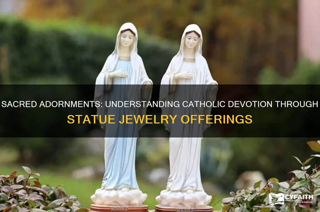 why do catholics give jewelry to statues