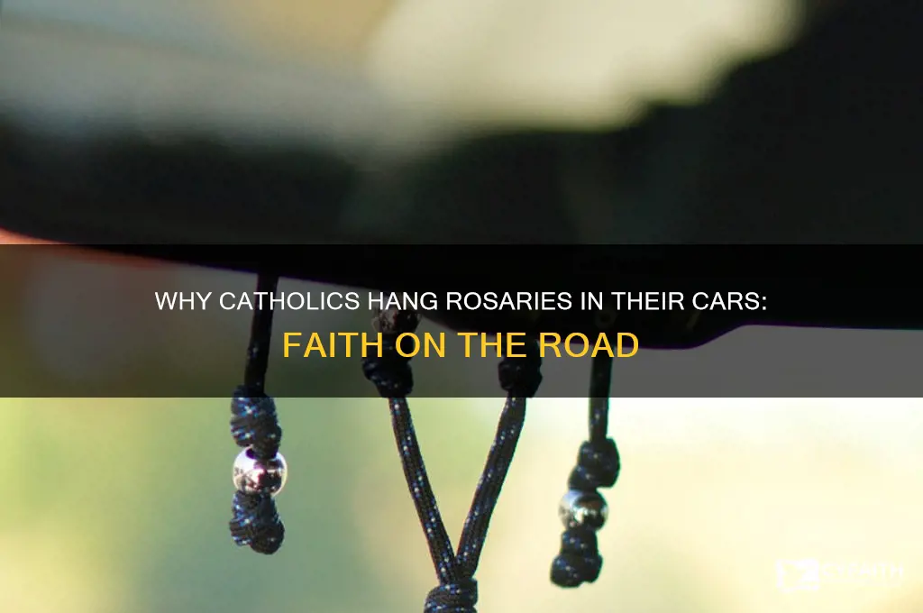why do catholics hang rosaries in their cars