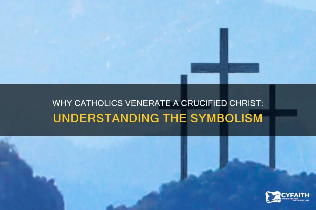 why do catholics have a dead guy on their cross