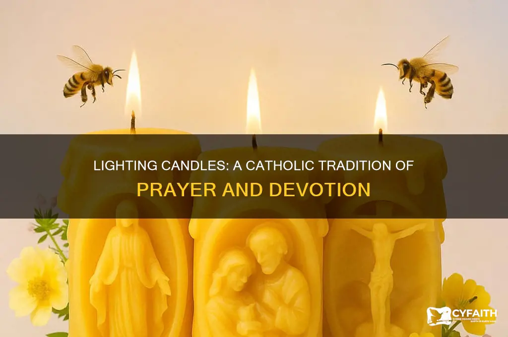 why do catholics light candles in front of statues