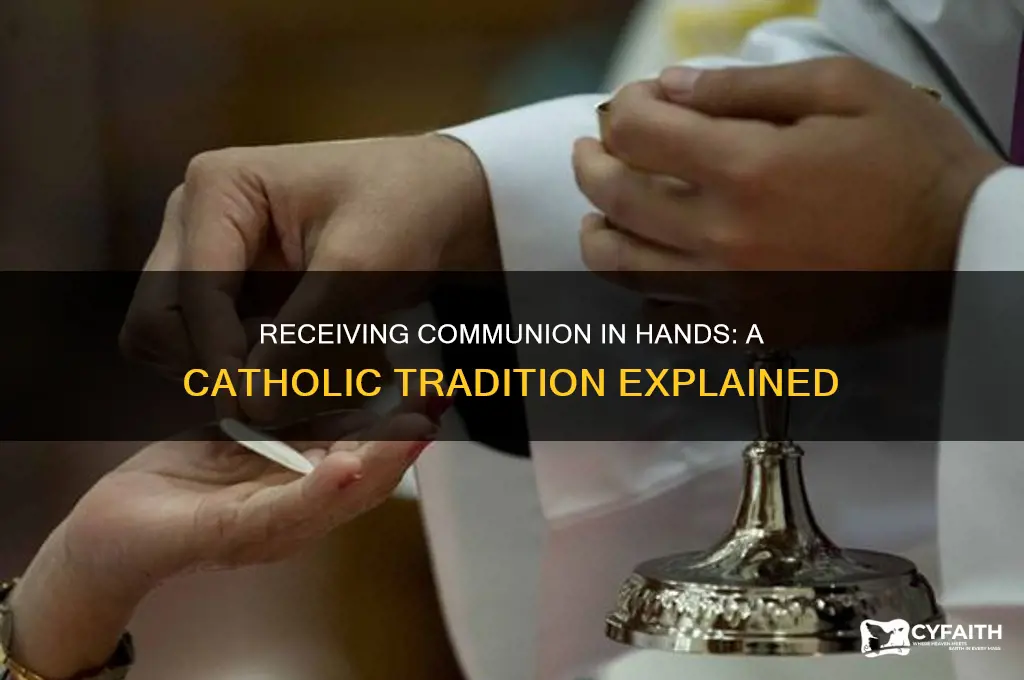 why do catholics receive communion in the hands