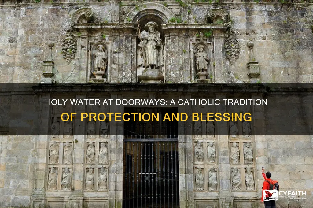 why do catholics use holy water around doors