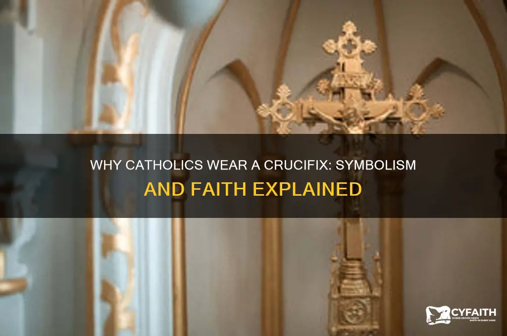 why do catholics wear a crucifix