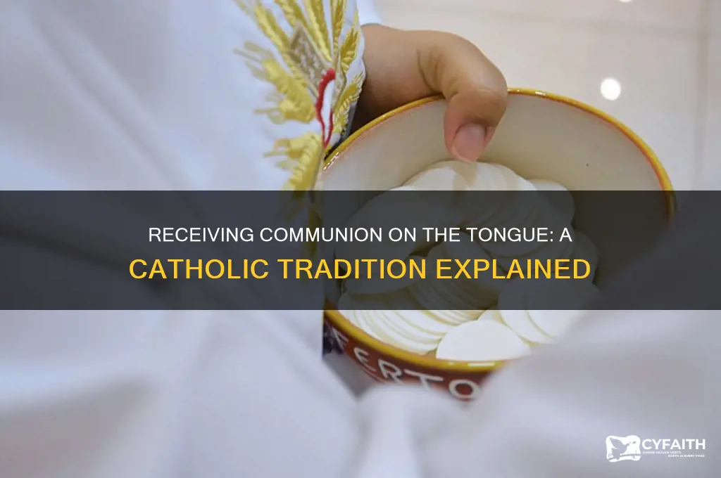 why is the host received on the tongue catholic